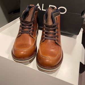 Beautiful Aldo dress or casual men’s boots. Never used…